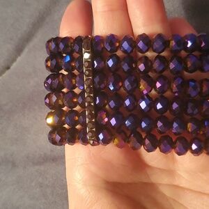 2 purple bracelets